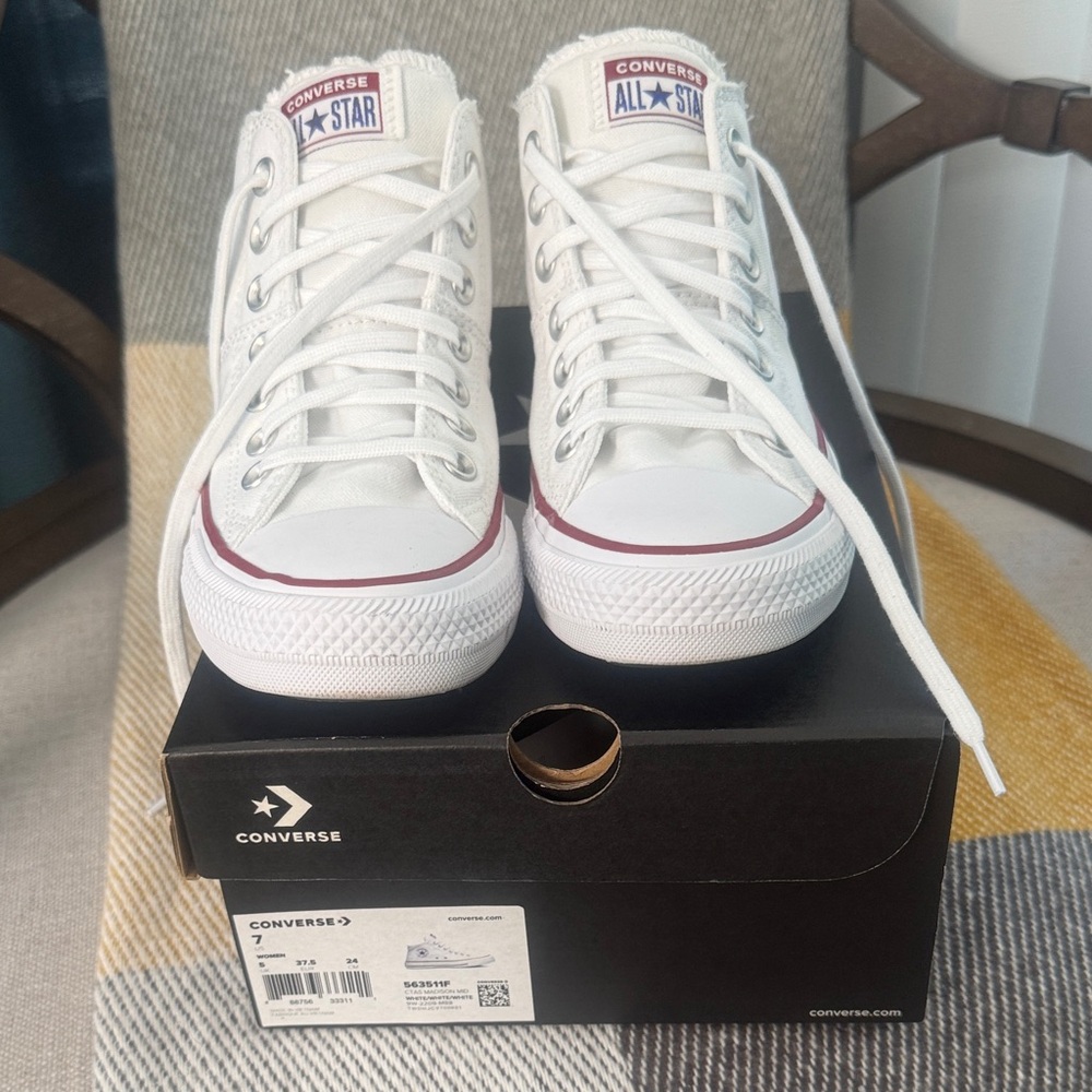 Converse All Star White High-Tops with Red Accents.